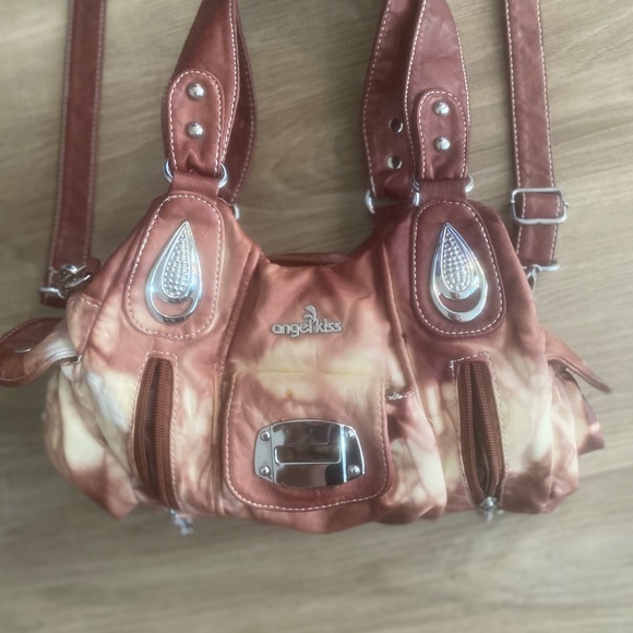 Never used gorgeous leather maroon and white purse. Perfect condition. - Picture 1 of 13